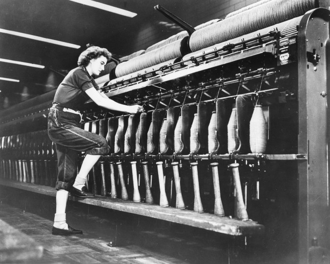 Photo of a woman working Machinery