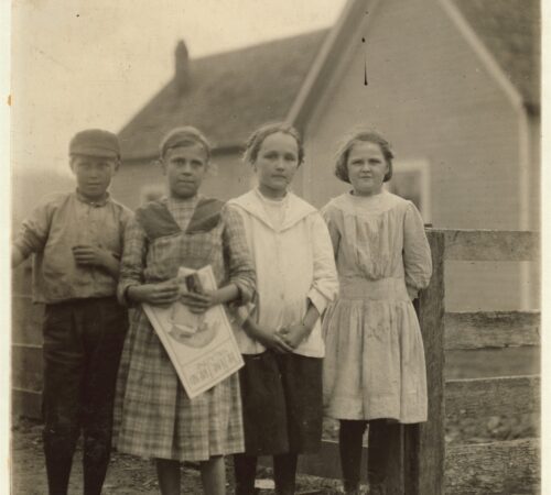 Photo of a group of young mill workers