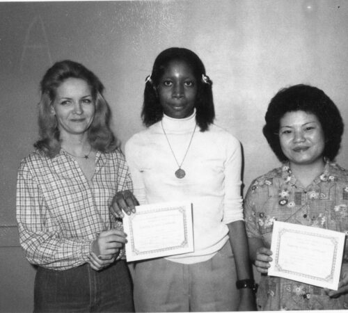 Photo of two women receiving certifications as pillowcase sowers