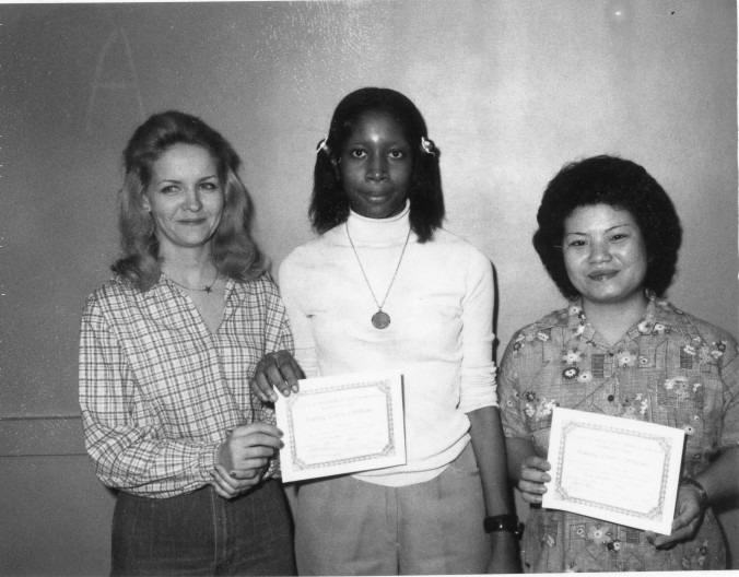 Photo of two women receiving certifications as pillowcase sowers