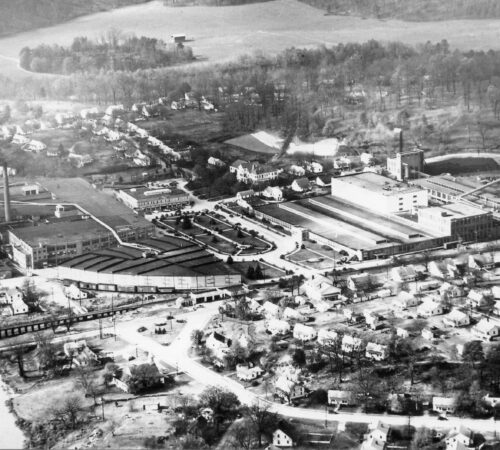 early aerial view of the Trion mill and housing